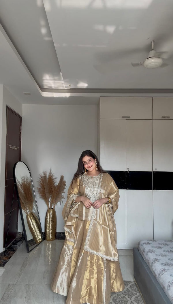 KOMAL MAURYA IN GOLDEN SILVER TISSUE LEHNGA SET