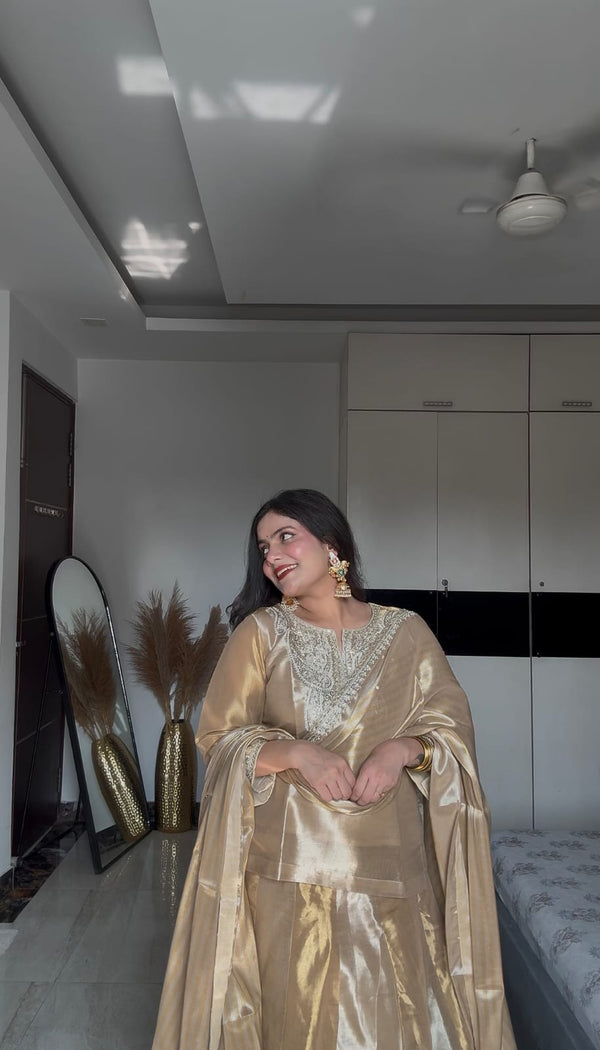 KOMAL MAURYA IN GOLDEN SILVER TISSUE LEHNGA SET