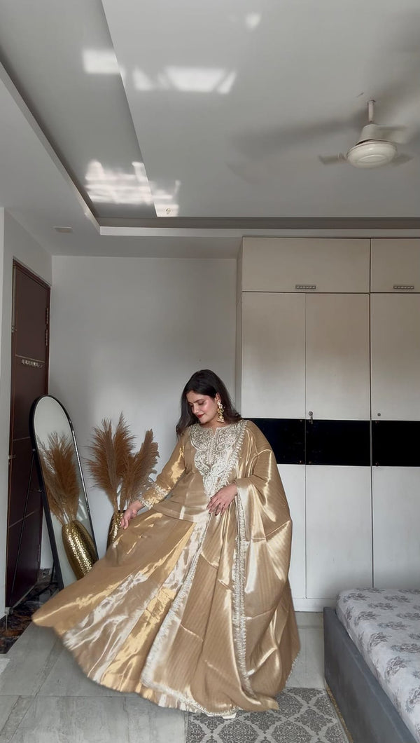 KOMAL MAURYA IN GOLDEN SILVER TISSUE LEHNGA SET