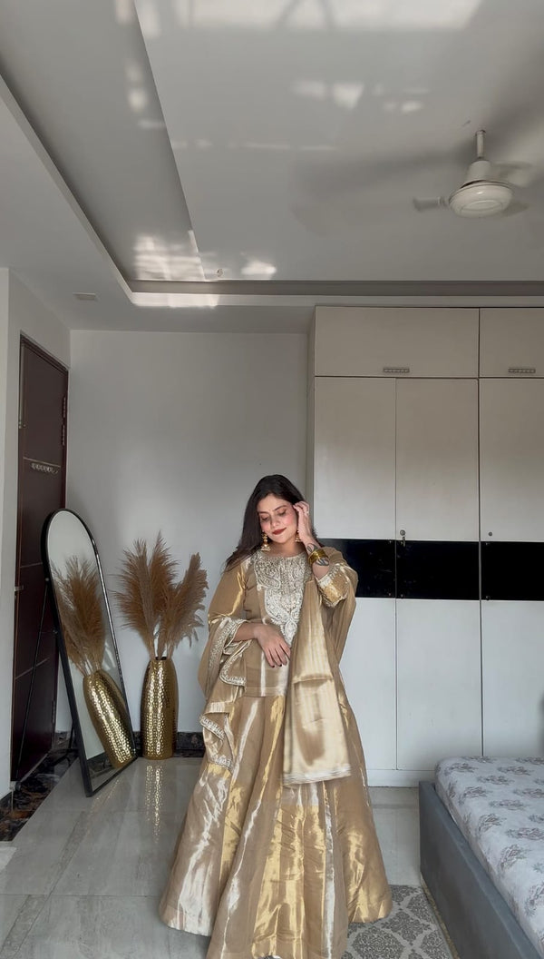 KOMAL MAURYA IN GOLDEN SILVER TISSUE LEHNGA SET